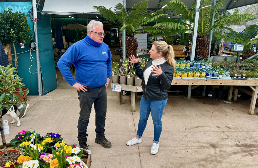 Hannah at a garden centre hearing from the owner about their development plans